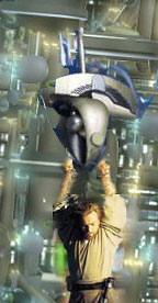 Obi-Wan hangs from the assassin's probot.