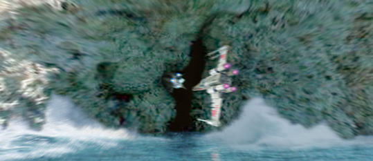 The starfighters slip quickly into the narrow gap in the coral rock !