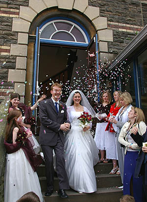 Jo and Nat walk through the confetti