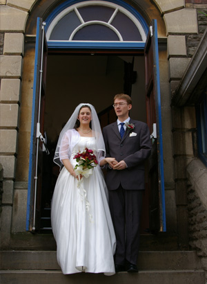 Joanne and Nathaniel on the steps outside the Church