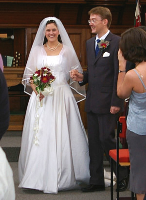 Joanne and Nathaniel walk up the aisle to the Star Wars Fanfare !